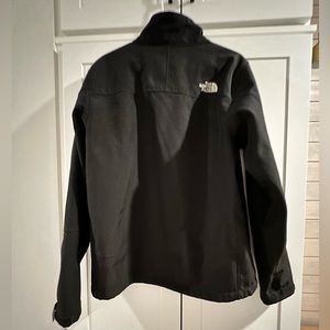 The North Face black shell jacket. Size large.